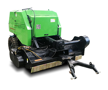 Round baler with cutter